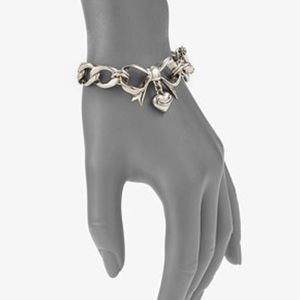Authentic Juicy Couture bow bangle bracelet
